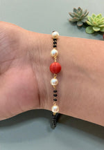 Load image into Gallery viewer, Beautiful black beads bracelet with coral bead