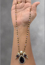 Load image into Gallery viewer, Beautiful black beads chain with purple stone pendant with peacock design