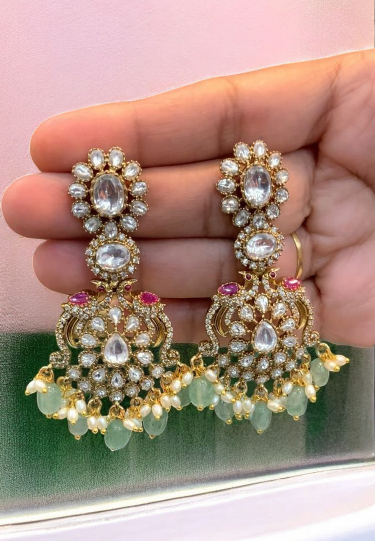 Beautiful earrings with kundan stone and uncut stone