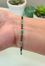 Load image into Gallery viewer, Beautiful black beads bracelet with green beads