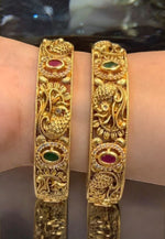 Load image into Gallery viewer, Beautiful bangles with peacock design and green pink stones