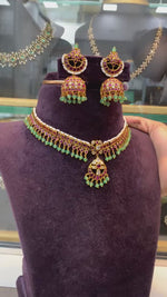 Load and play video in Gallery viewer, Beautiful kundan necklace with green stone
