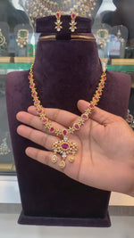 Load and play video in Gallery viewer, Beautiful party wear short necklace with pink stone
