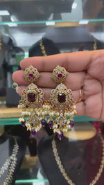 Load and play video in Gallery viewer, Stunning earrings with purple stone and guttapusalu hangings
