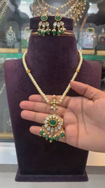 Load and play video in Gallery viewer, Beautiful pearls chain with green stone pendant
