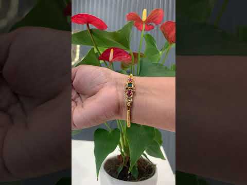 Beautiful bracelet with green and pink stone