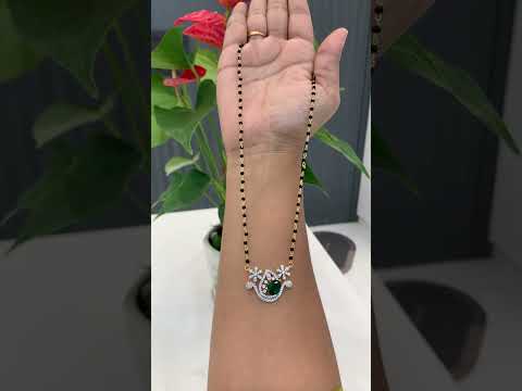 Beautiful black beads chain with green stone