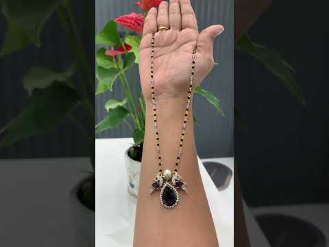 Beautiful black beads chain with purple stone pendant with peacock design