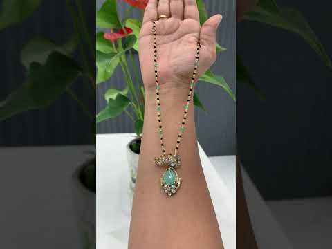 Beautiful black beads chain with blue stone pendant with elephant designed