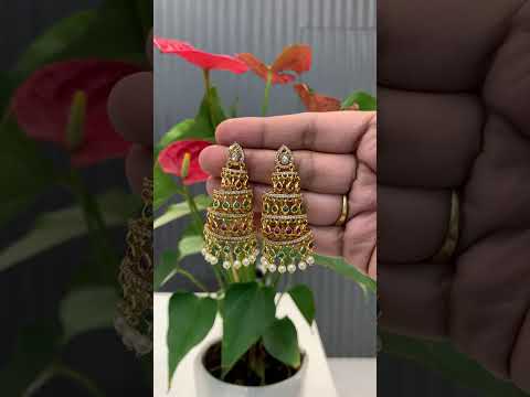 Beautiful earrings with green and Pink stone