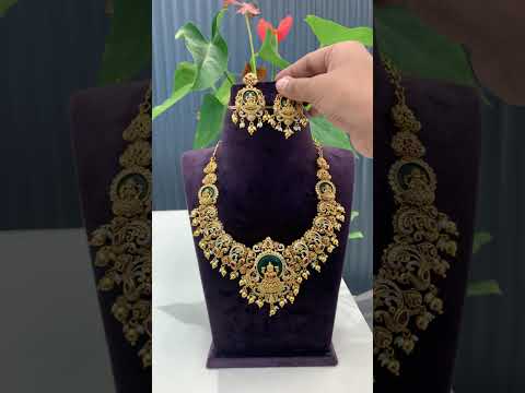Beautiful short necklace with Laxmi Devi motive and moissanite stones