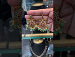 Load and play video in Gallery viewer, Beautiful earrings with green beads and pink stone
