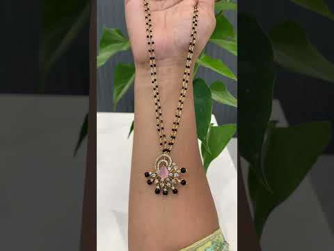 Beautiful black beads chain with two layers and light pink stone