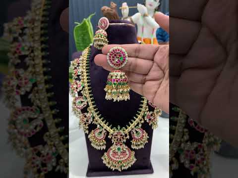 Traditional long jadav kundan stone haram with green beads