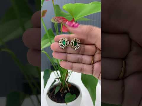Beautiful studs with green stone and diamond replica