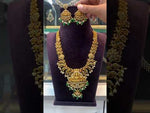 Load and play video in Gallery viewer, Beautiful short necklace with green Beads and god Laxmi Devi motive pendant

