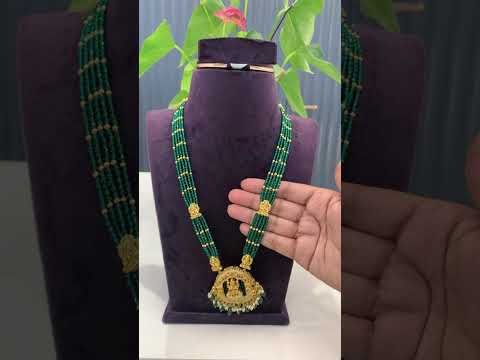 Beautiful beads haram with green beads and Laxmi Devi motive pendant