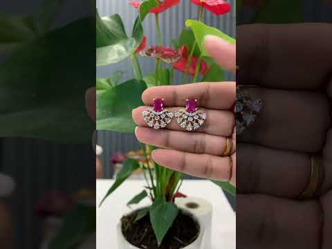 Beautiful gj polish studs with green stone