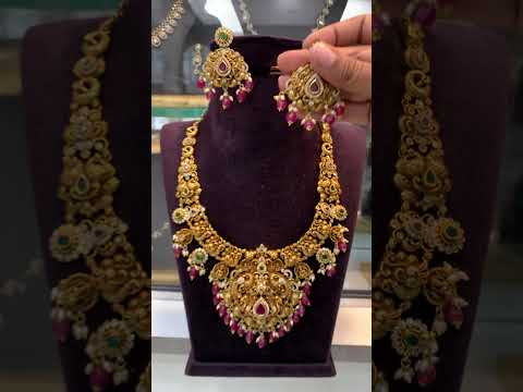 Traditional short necklace with nakshi polish and ruby beads