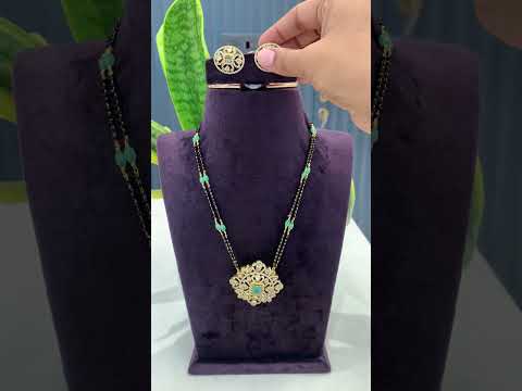 Beautiful black beads chain with mint green stone