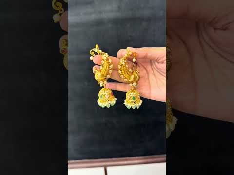 Beautiful earcuffs with peacock design