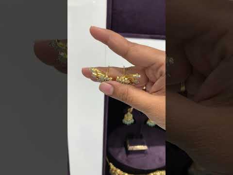 Beautiful ear studs with green stone