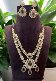 Beautiful two layer necklace with purple colour stones and peacock design -pairing with beautiful earrings