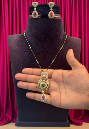 Beautiful chain with green and Ruby stone