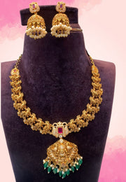 Traditional necklace with peacock design and pink stone with green beads and guttapusalu hangings