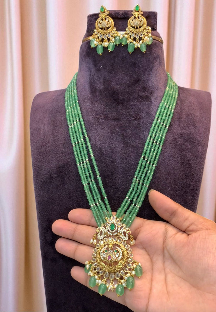 Stunning beads haram with green beads and peacock design pendant