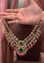Beautiful short necklace with diamond look and green stones with light Ruby stone hangings
