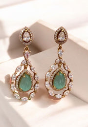 Beautiful earrings with uncut stone -and blue stone