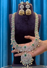 Load image into Gallery viewer, Beautiful long and heavy GJ polish necklace with green stone
