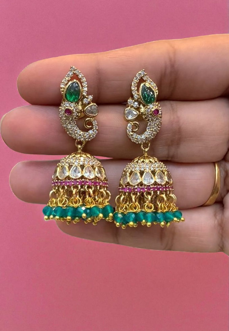 Beautiful jumkhas with green stone and Victorian polish