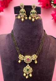 Beautiful short black beads mala with green stone and pink stone