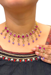 Beautiful short necklace with Ruby stone and purple hangings