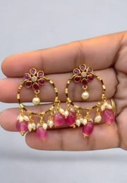 Beautiful earrings with red stone