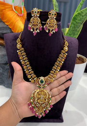 Beautiful short necklace with ruby beads and Laxmi Devi motive pendant