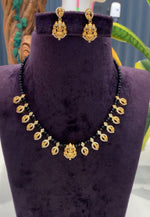 Load image into Gallery viewer, Beautiful black beads chain with Laxmi Devi motive pendant
