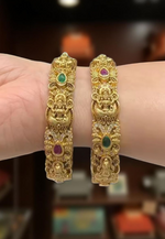Load image into Gallery viewer, Beautiful Lakshmi Devi motive bangles with Ruby and green stone
