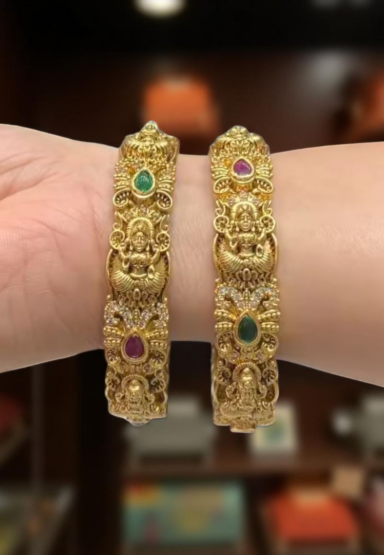 Beautiful Lakshmi Devi motive bangles with Ruby and green stone