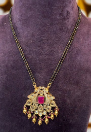 Beautiful two layer black beads chain with pink stone and peacock design pendant
