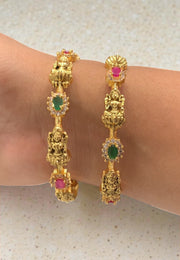 Traditional nakshi bangles with green and pink stone