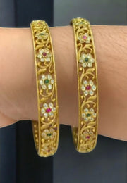 Beautiful bangles with green and pink stone