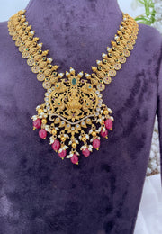 Traditional short necklace with red beads mam laxmi devi motive