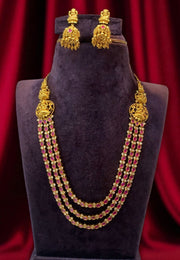 Beautiful three layer long haram with ruby stone and Laxmi Devi motive