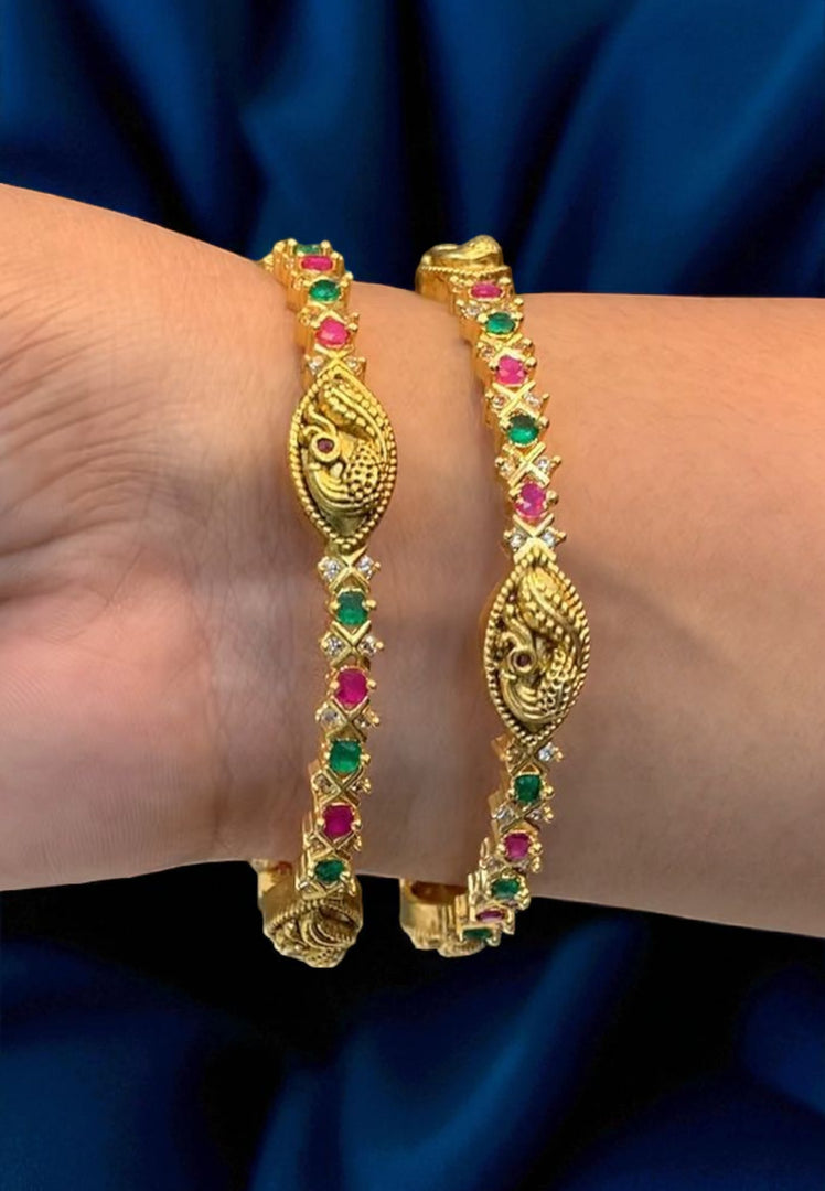Traditional nakshi bangles with pink and green stone