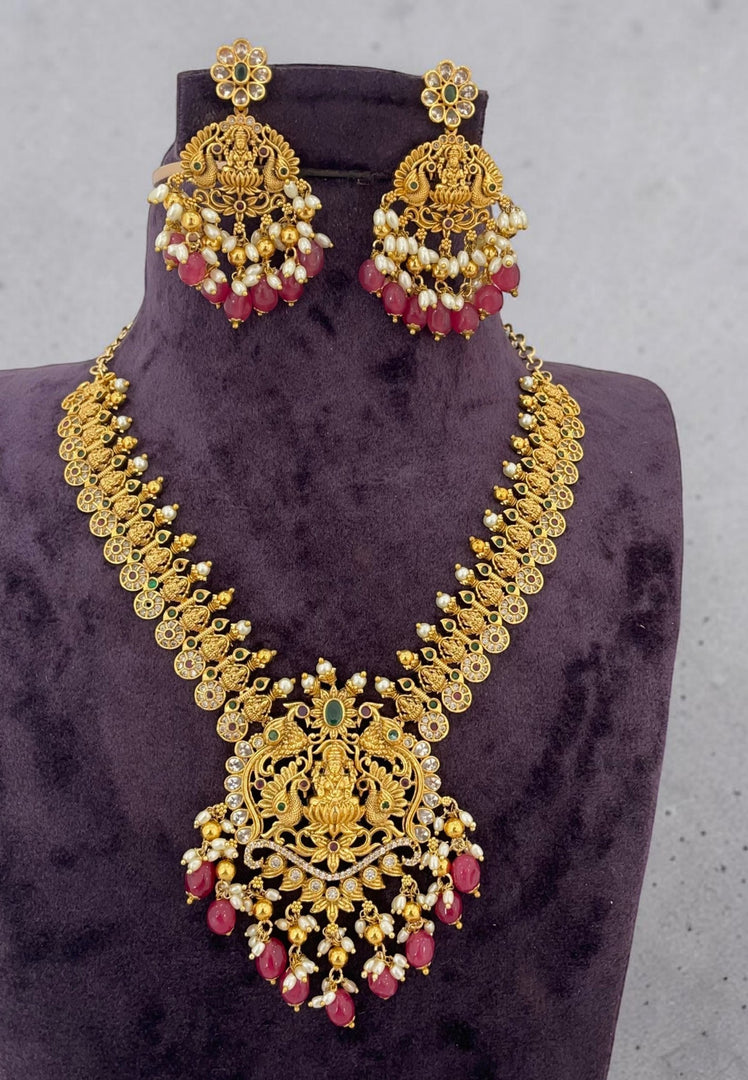 Traditional short necklace with red beads mam laxmi devi motive