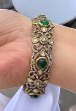 Load image into Gallery viewer, Stunning Victorian polish bangle with green stone
