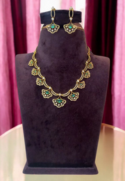 Simple party wear short necklace with green stone and uncut stone